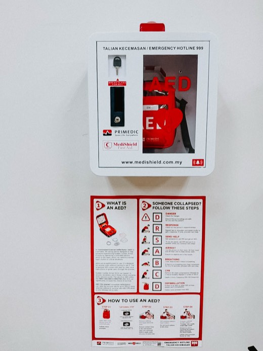 MYHeart AED in a wall cabinet with AED signage, installed on site